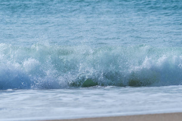 Beautiful waves crashing on the shore