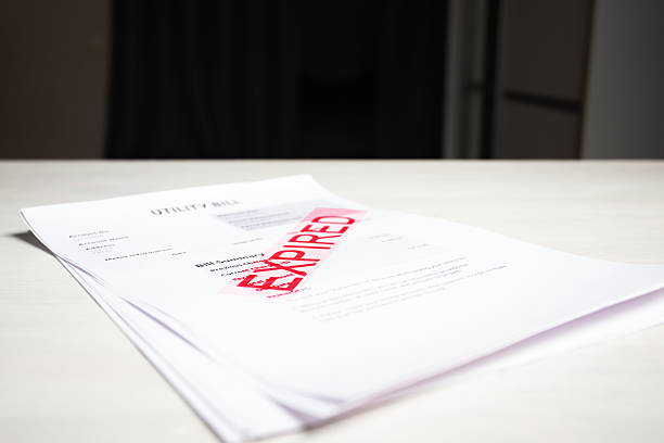 istock Expired Utility Bill Notice, warning about increasing household utility costs, financial data summary for budgeting and expenses 2205361841