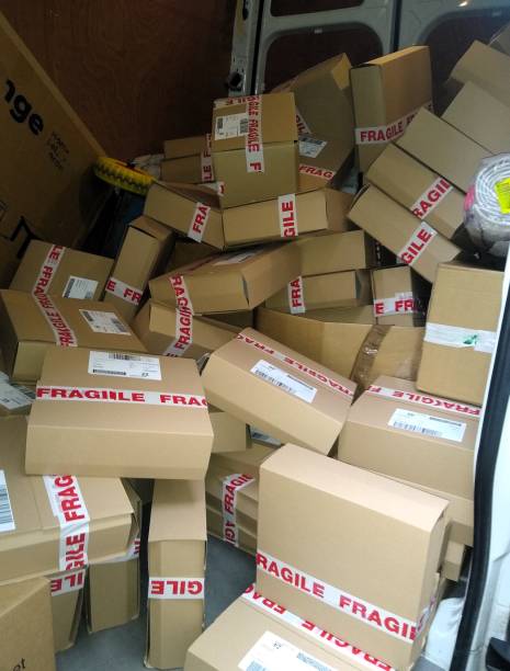 istock Fragile Parcels in Chaos: Scattered Inside a Transport Vehicle