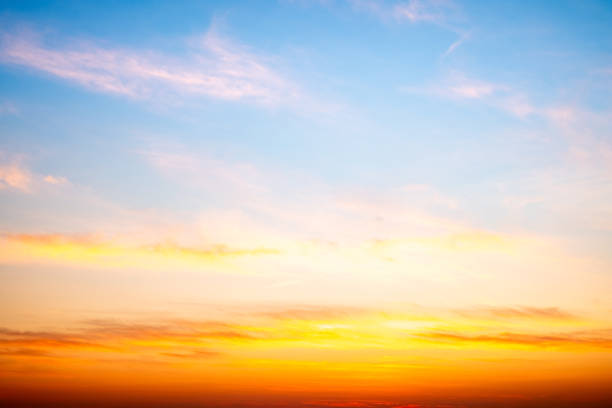 istock Beautiful , luxury soft gradient orange gold clouds and sunlight on the blue sky perfect for the background, take in evening,Twilight, Large size, high definition landscape photo 2205366871