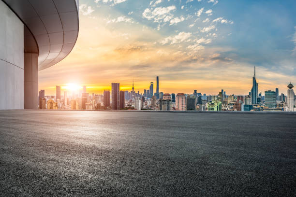 istock Empty asphalt road and cityscape with skyline in Shanghai at sunset 2205369929