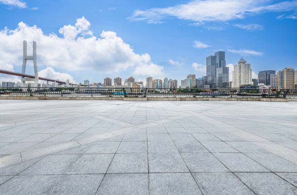 istock Empty square floor and cityscape with skyline in modern city 2205370197