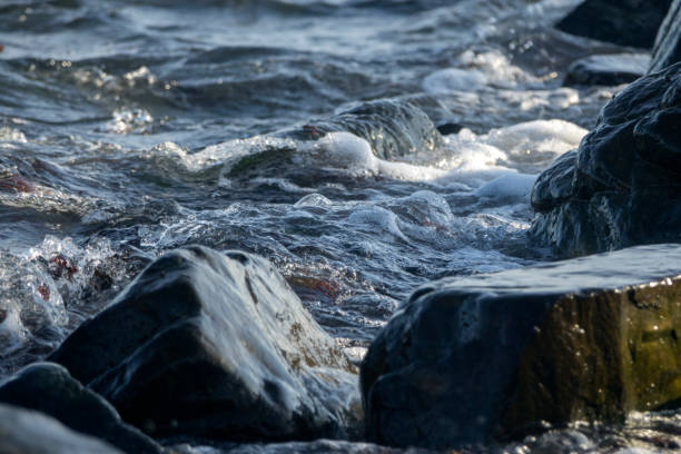 istock close-up of the rocks and wave 2205372370