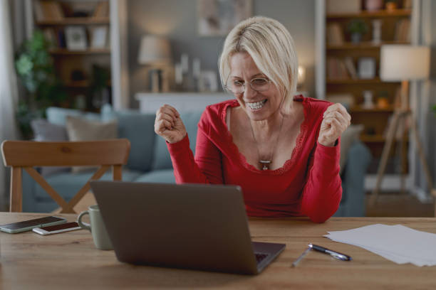 istock Woman working from home on laptop 2205373341