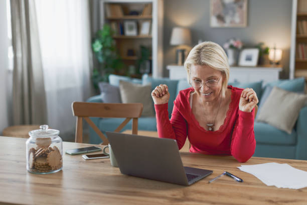 istock Woman working from home on laptop 2205373354