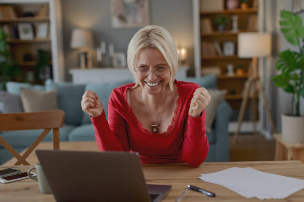 istock Woman working from home on laptop 2205373388