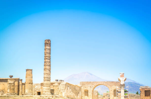 ruins of Pompeii with Vesuveus volcano in background, Italy