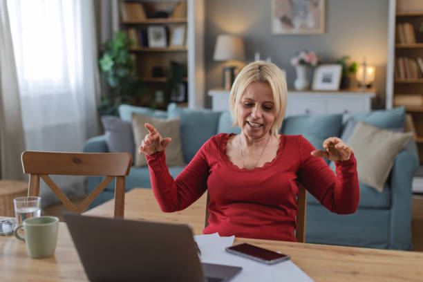 istock Woman working from home on laptop 2205373719