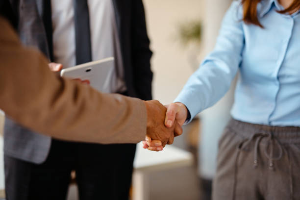 istock Business people shaking hands during a meeting in the office 2205375115