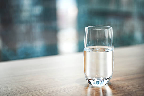 istock glass of clean water on the table 2205375193