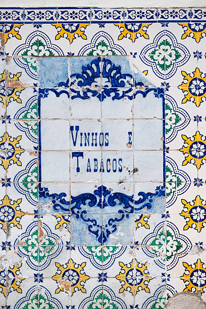 istock Traditional azulejo facade in Lisbon with the inscription Vinhos e Tabacos (Wine and Tobacco) 2205375366