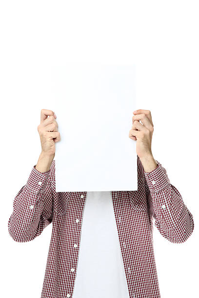 istock Young man holding blank board on white background 2205375382