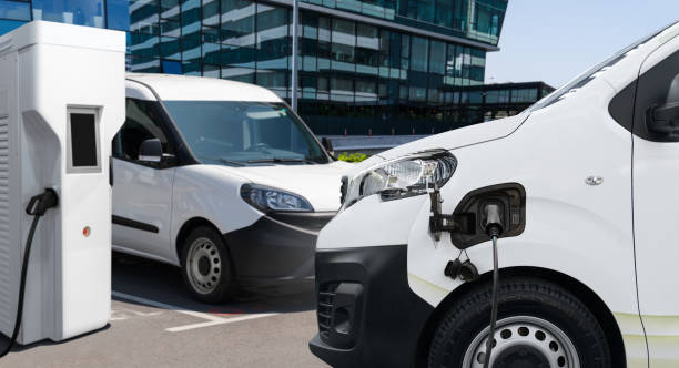 istock Electric delivery van with charging station 2205378008
