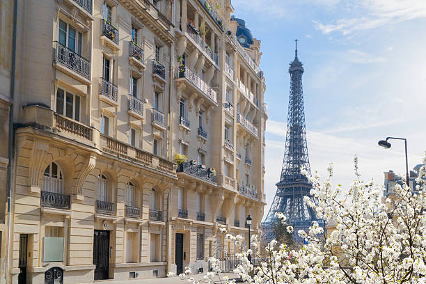 istock eiffel tour and Paris street 2205379417
