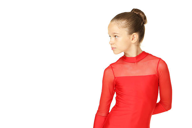 Young girl gymnast on white background