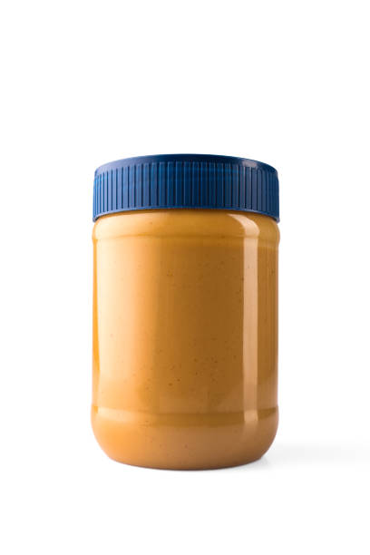 istock Delicious and healthy peanut butter on white background 2205383675