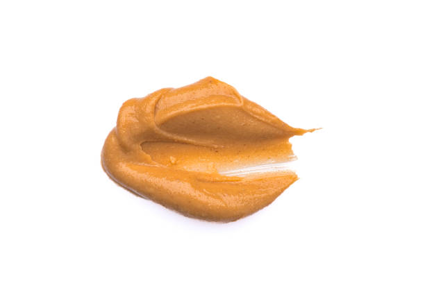istock Delicious and healthy peanut butter on white background 2205383676