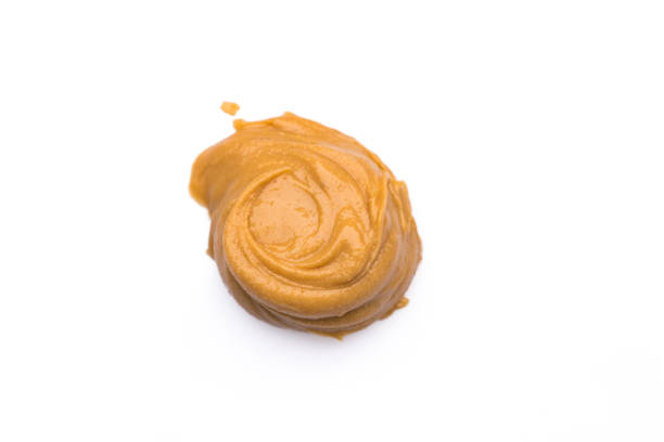 istock Delicious and healthy peanut butter on white background 2205383686