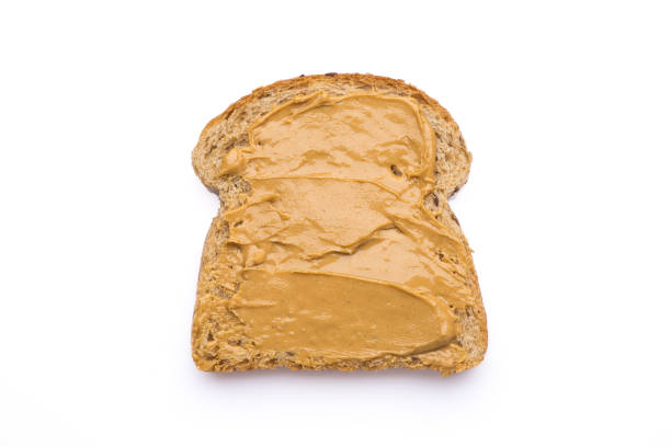 Delicious and healthy peanut butter on white background