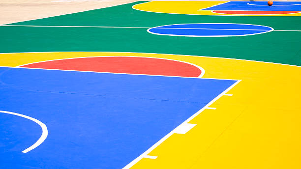 istock Outdoors basketball court with colorful pattern and white outline on concrete floor surface, sport field background, side view 2205387030