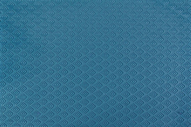 istock Detailed texture of padded mat material in blue color, with a visible surface 2205389407