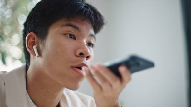istock Teenager using ai voice assistant with education. 2205390292