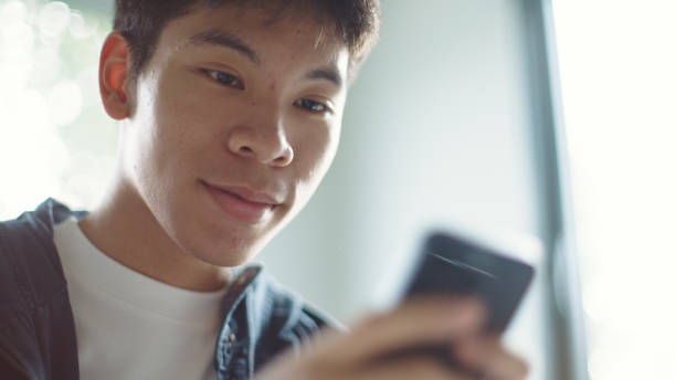 istock Man celebrating good news. 2205392708