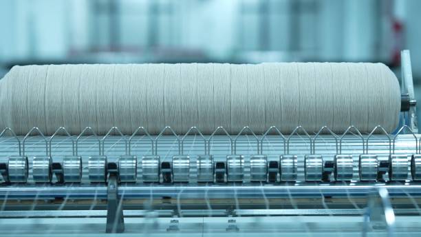 istock Warping machines in a woolen sweater factory 2205399570