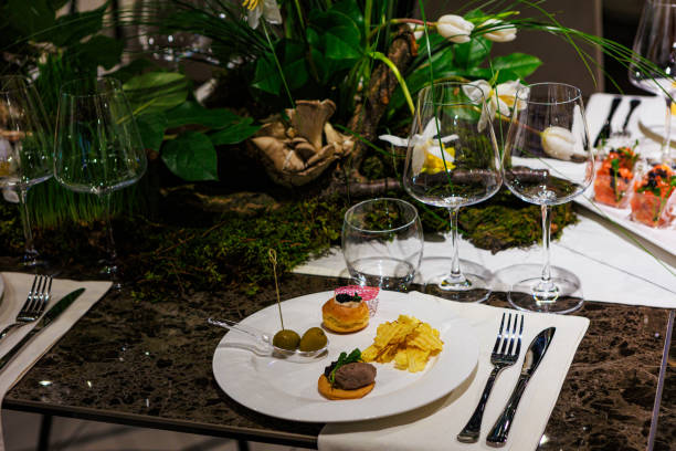 istock Elegant gourmet appetizers served on white porcelain. 2205405102