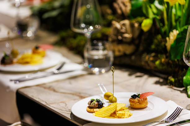 istock Elegant gourmet appetizers served on white porcelain. 2205405166