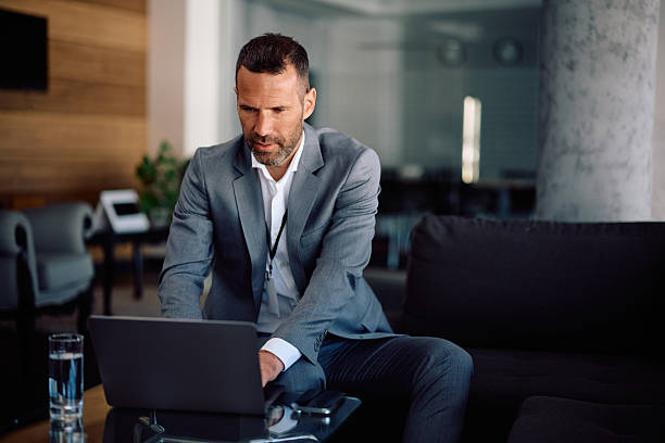istock Corporate manager working on laptop in the office. 2205405407