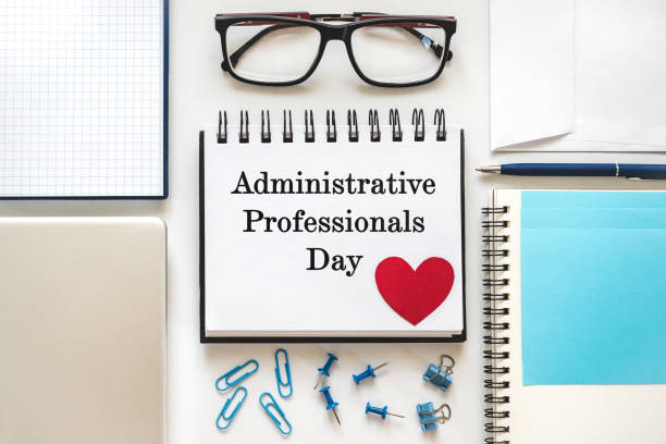 istock Happy Administrative Professionals Day. Notepad with congratulatory inscriptions 2205407273