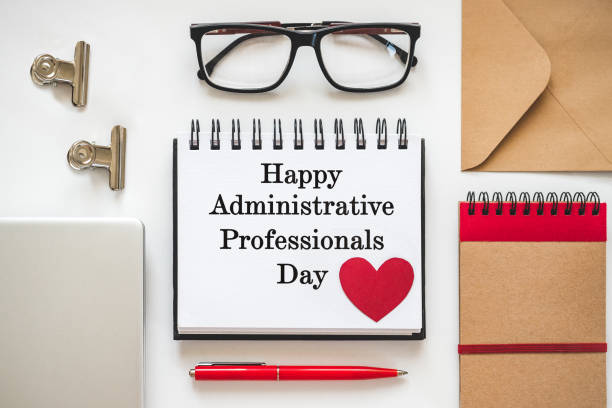istock Happy Administrative Professionals Day. Notepad with congratulatory inscriptions 2205407286
