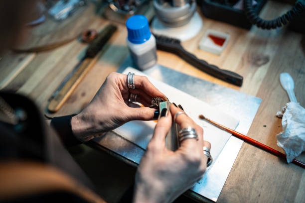 istock Craftsperson Working on Handcrafted Item in a Detailed Workshop Setting 2205407318