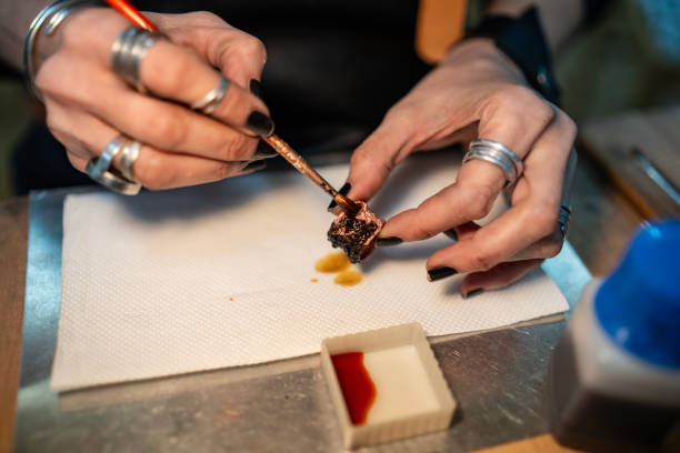istock Handcrafting Artisan Working On a Small Sculptural Piece in a Workshop 2205407326
