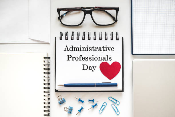 istock Happy Administrative Professionals Day. Notepad with congratulatory inscriptions 2205407349