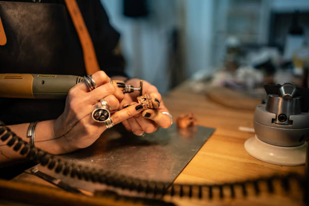 Artisan Working on a Handcrafted Jewelry Piece in a Workshop Setting
