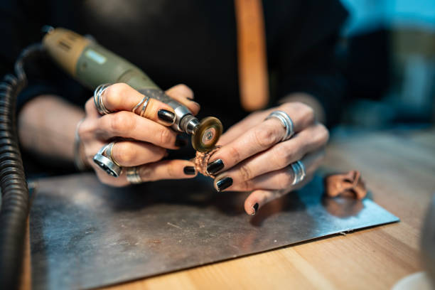 istock Close-Up of Hands Working With a Metal Tool in a Workshop 2205407428