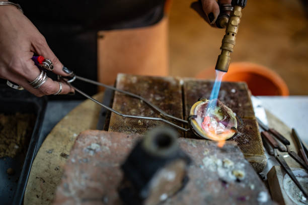 istock Close-Up of a Metalworker Heating Material with a Blowtorch Tool 2205407978