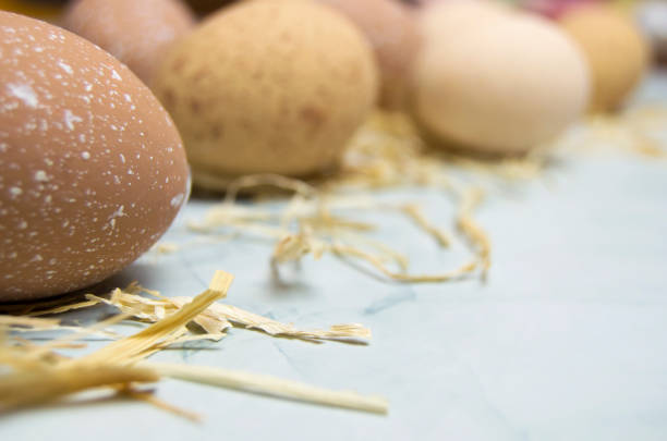 Easter eggs on marble background.Happy Easter concept. Preparation for holiday.Simple minimalism, flat lay, top view, copy space.