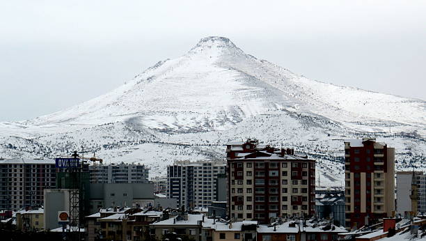 istock snowy mountain and city view in konya 2205411362