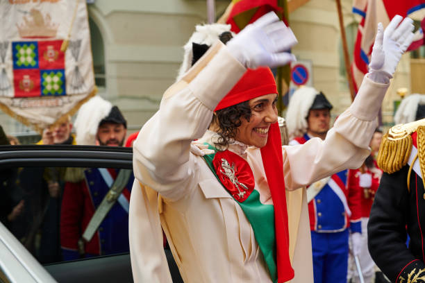 the musical orchestra in South Tyrolean costumes crosses the whole village playing typical songs villnosser dorffest, Feast of the village - July 8 2018 St Peter Val di Funes Italy