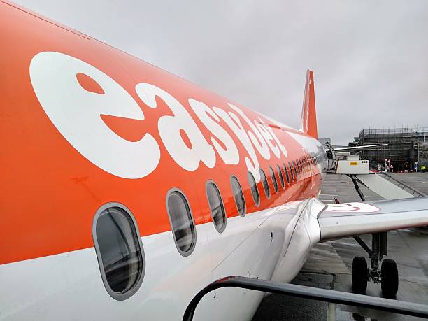 Bristol, England, United Kingdom - 02/20/2025: easyJet close-up at company logo palced on airplane