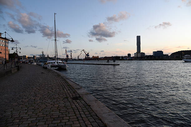 Gothenburg, swedens 2nd largest city with some nautical vessels on river. Captured during summer season.