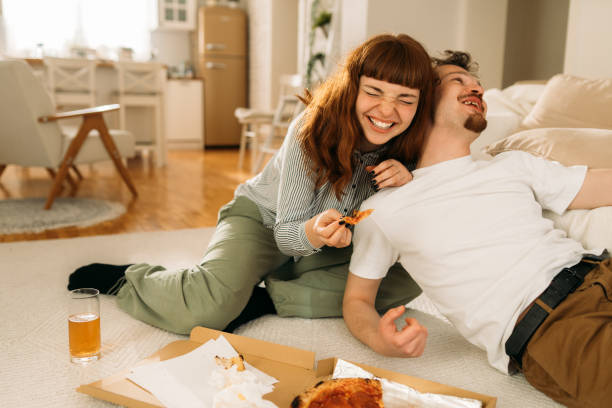 istock Playful Moments Over Pizza 2205427908