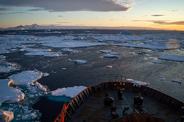 istock Icebreaker Ship Crashing Through Antarctic Ice – Climate Change and Polar Expedition 2205429811