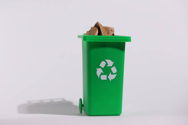 istock Green recycling bin, recycle trash comtainer, isolated 2205430370