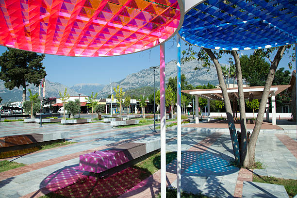 The morning view of colorful shadows on a main square in Kemer resort town (Turkey).
