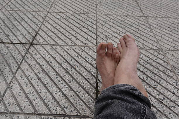 People warm their feet by the fire in winter.