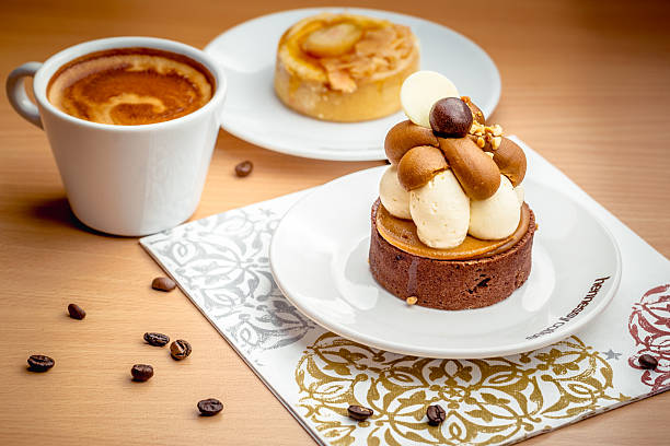 A cup of Coffee, Cake and Pastry served in a cafe / restaurant style setting